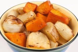 Bowl of roasted sweet potatoes and onions pieces