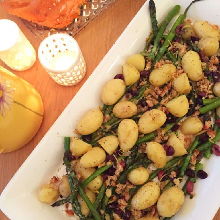 Roasted baby potatoes and asparagus with olives and breadcrumbs