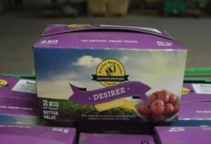 2kg box of Desiree potatoes with product branding