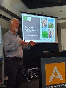 Man giving presentation on future proofing vegetable production risks