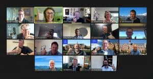 Virtual team video call with participants giving thumbs up signs