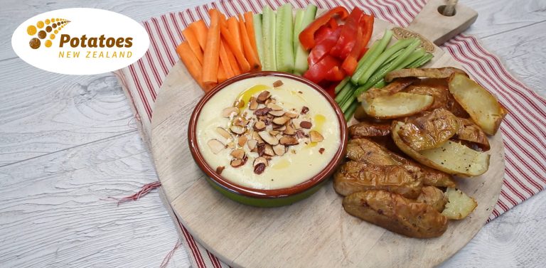 Roasted potatoes with vegetable sticks and creamy dip platter
