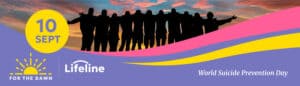 Group of people silhouetted at sunset for suicide prevention awareness
