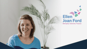 Smiling woman with a plant, representing fresh produce and agriculture.