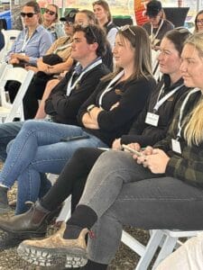 Audience attentively listening at an indoor conference event